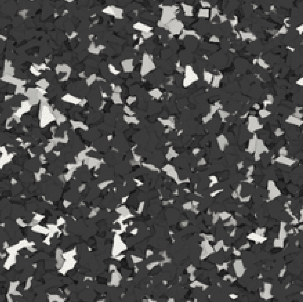 The image shows a close-up of a dark, fragmented abstract texture with various shades of black and gray, resembling a rough, irregular surface.